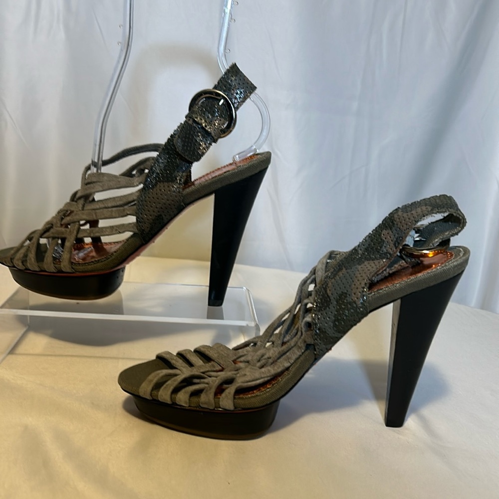 Olive 5" faux side and snakeskin heels with platform. never worn.